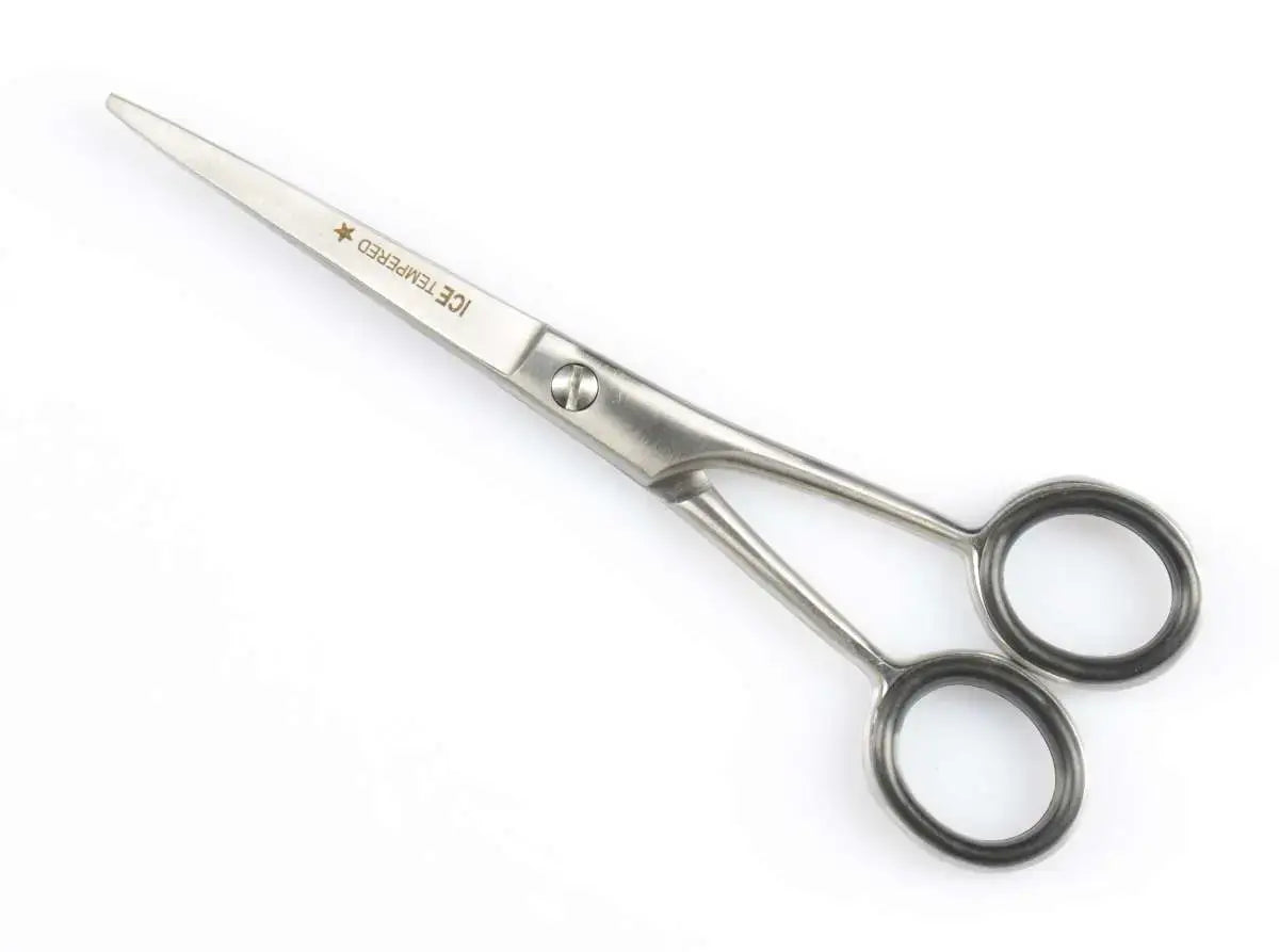 Hairdressing scissors with micro-serration